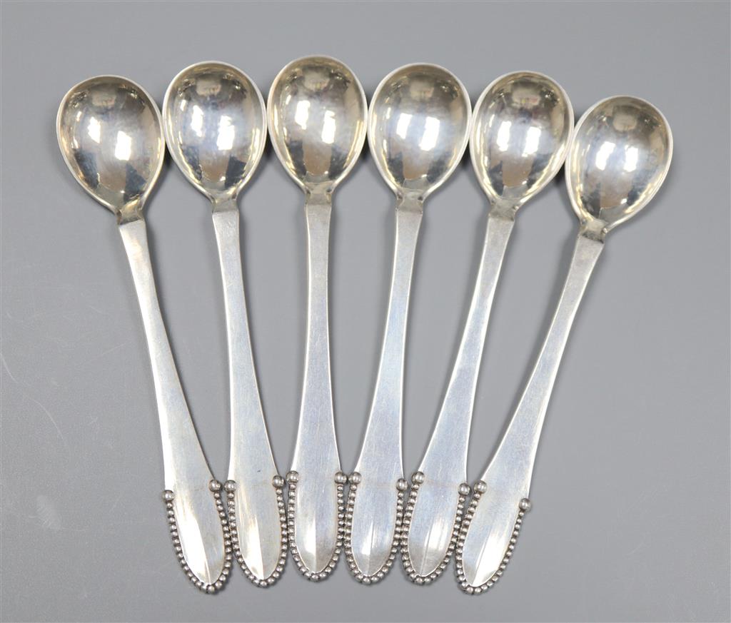 A set of six 1920s Georg Jensen silver egg? spoons, import marks for London, 1925, 11.2mm, 75 grams.